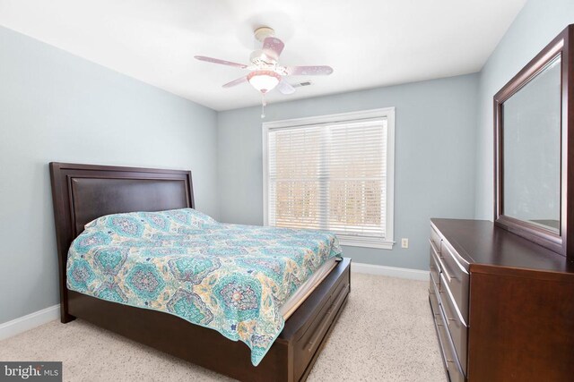 bedroom featuring ceiling fan