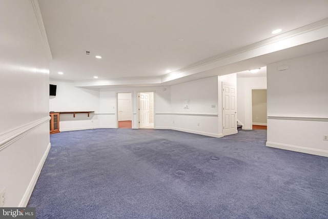 finished basement with recessed lighting, crown molding, baseboards, and dark colored carpet