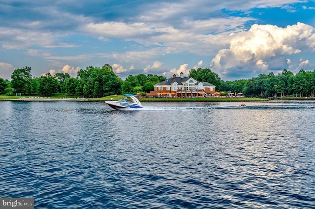 view of water feature with a dock