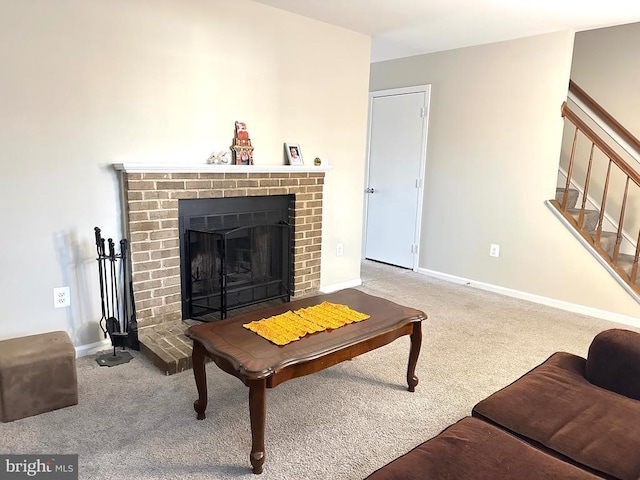 carpeted living room featuring a brick fireplace