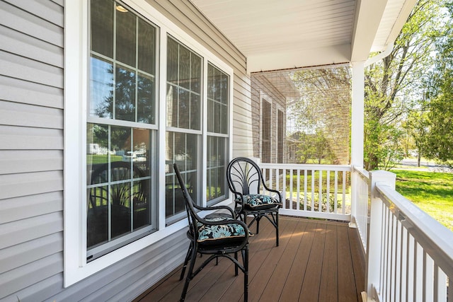 wooden deck featuring a porch