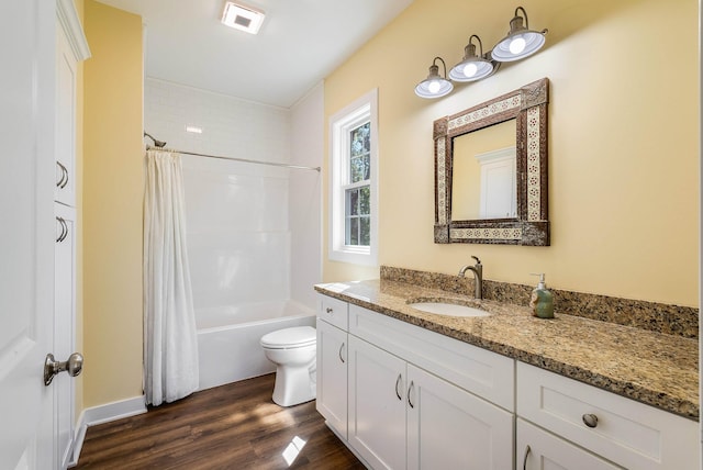 full bathroom featuring shower / bathtub combination with curtain, wood finished floors, visible vents, toilet, and vanity