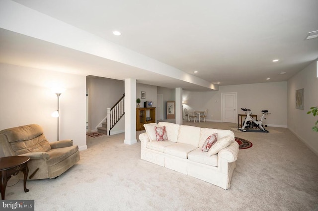 living room featuring light colored carpet