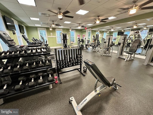 exercise room featuring a drop ceiling