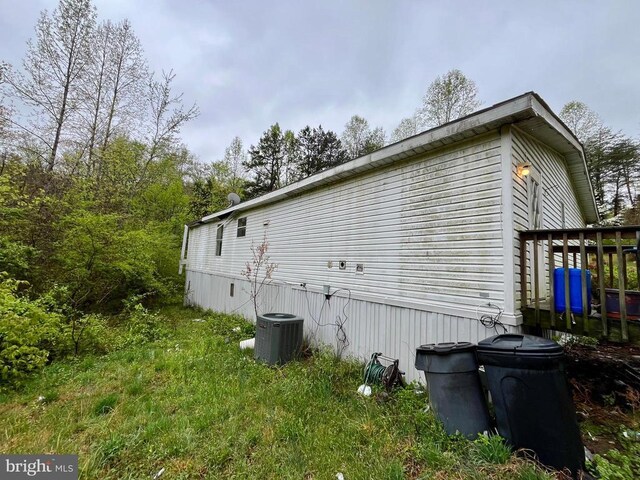 view of side of property featuring cooling unit