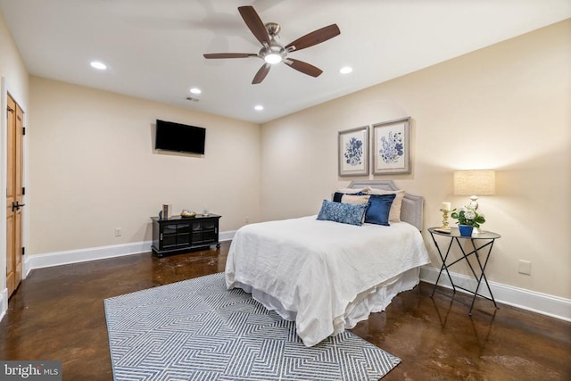 bedroom with finished concrete floors, baseboards, and recessed lighting