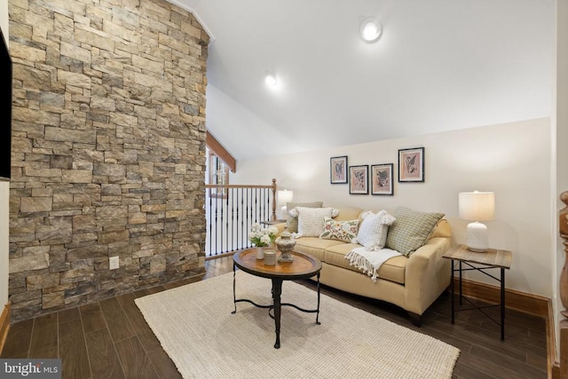 living room featuring lofted ceiling and wood tiled floor