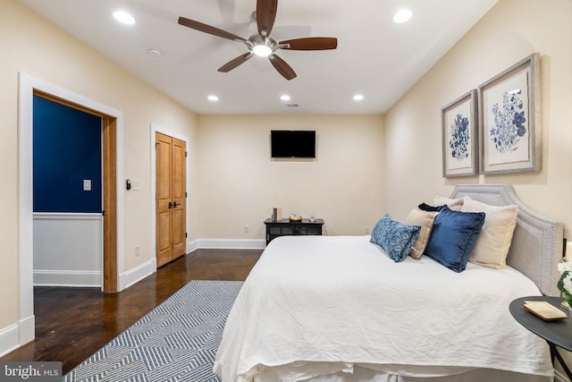 bedroom featuring a ceiling fan, recessed lighting, baseboards, and wood finished floors