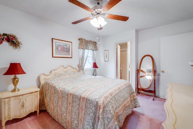 bedroom featuring ceiling fan and light carpet