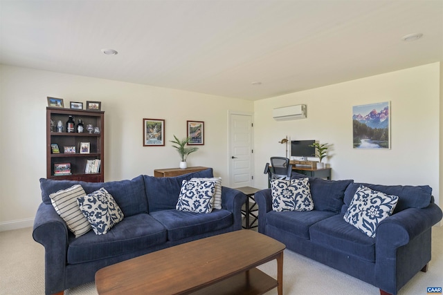 carpeted living area with baseboards and an AC wall unit