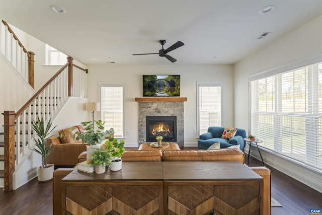 living room with ceiling fan, dark wood-style floors, baseboards, and stairway