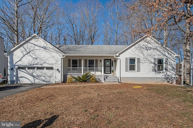 ranch-style house with aphalt driveway, covered porch, and an attached garage