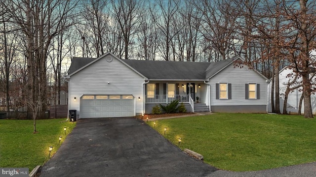 ranch-style house featuring aphalt driveway, a porch, an attached garage, and a front yard