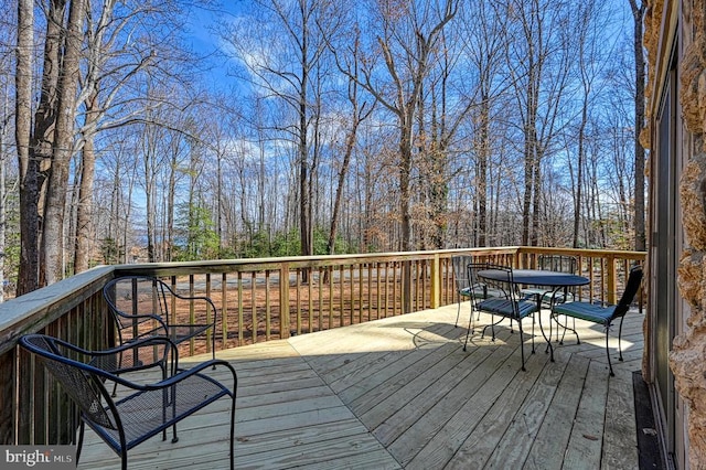 deck featuring outdoor dining space