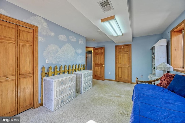 bedroom featuring visible vents, light carpet, and baseboards