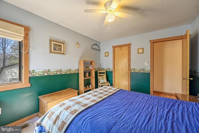 bedroom with visible vents and ceiling fan