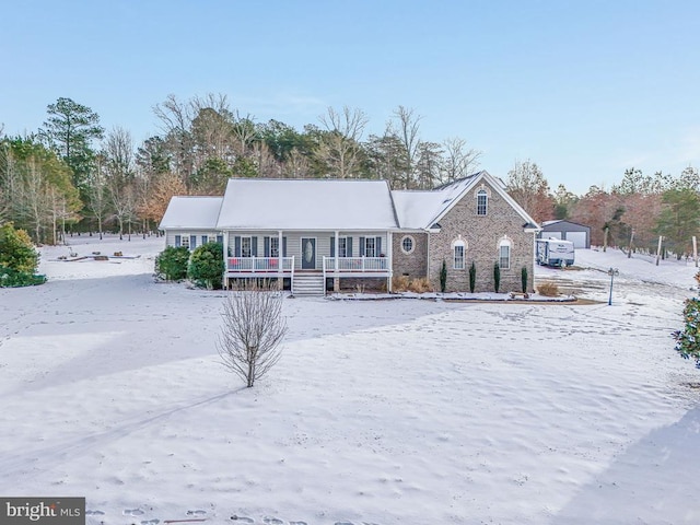 single story home with a porch