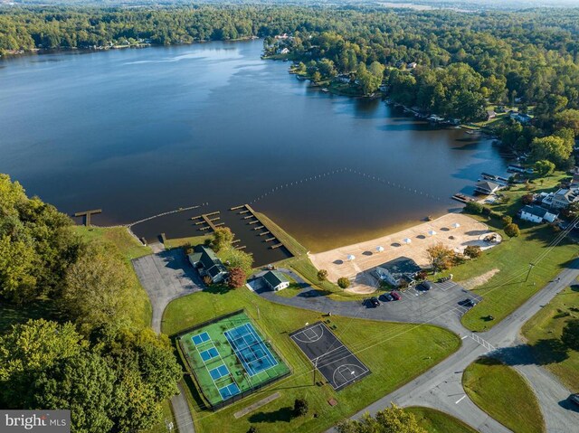 birds eye view of property featuring a water view