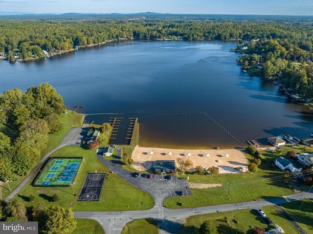 drone / aerial view with a water view