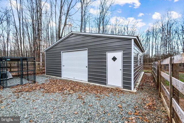 view of outbuilding featuring a garage