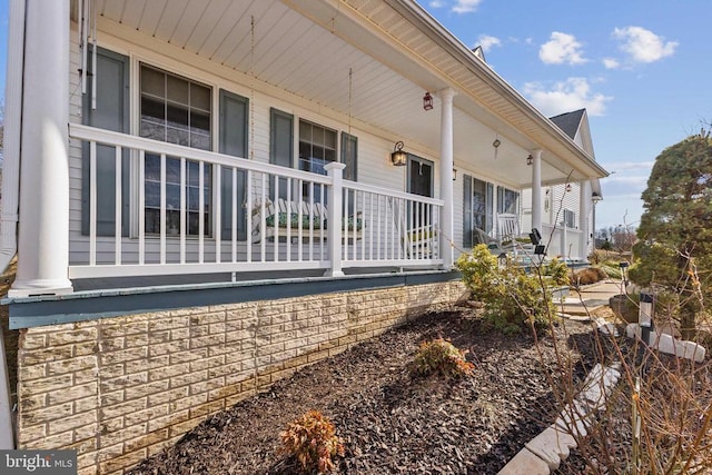 view of home's exterior with a porch