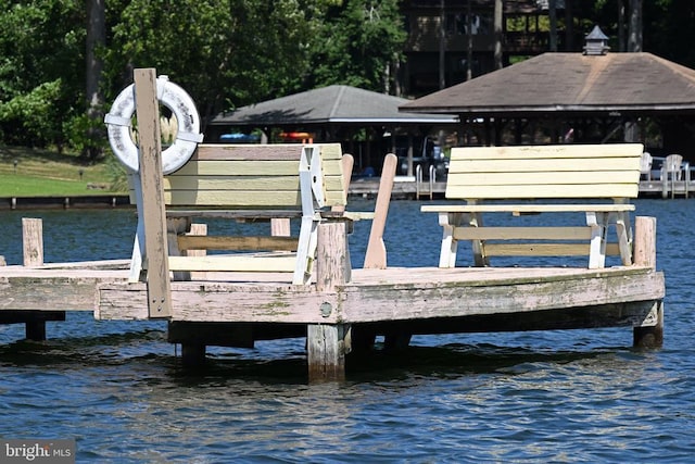 dock area featuring a water view