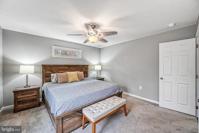 bedroom featuring ceiling fan, carpet floors, and baseboards