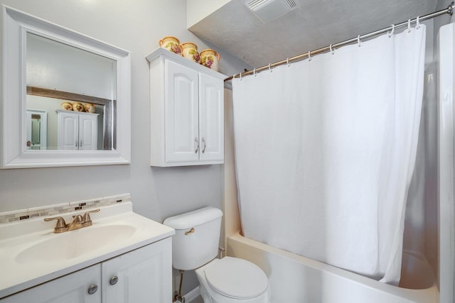 full bathroom featuring vanity, toilet, and shower / bath combo with shower curtain