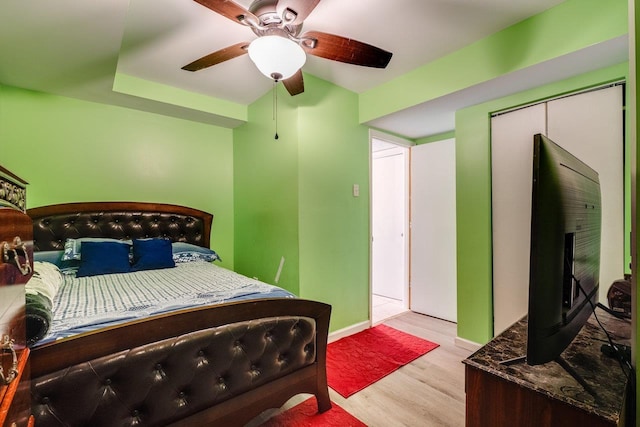 bedroom featuring ceiling fan and light hardwood / wood-style floors