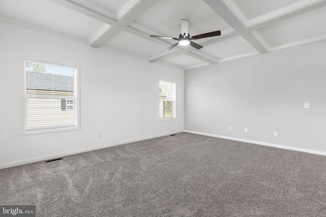 unfurnished room with coffered ceiling, ceiling fan, beam ceiling, and plenty of natural light