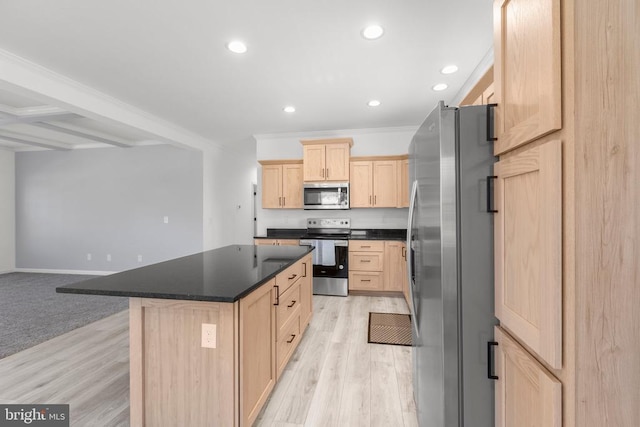 kitchen with dark countertops, stainless steel appliances, light brown cabinetry, recessed lighting, and light wood finished floors