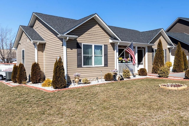 single story home featuring a porch, a front yard, roof with shingles, and central air condition unit