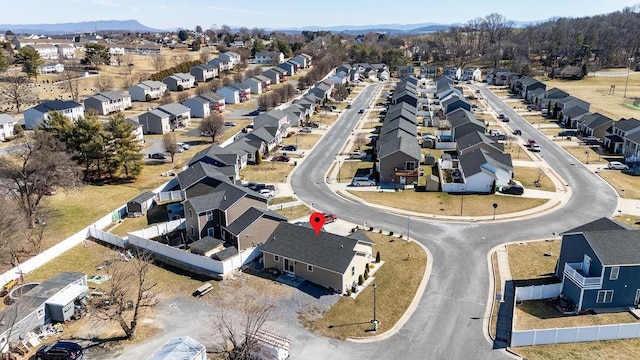 birds eye view of property with a residential view and a mountain view