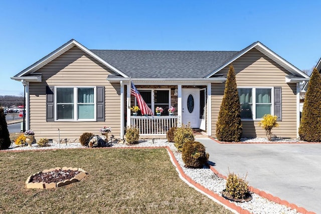 view of front of property with a porch, crawl space, roof with shingles, and a front lawn