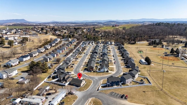 birds eye view of property with a residential view and a mountain view