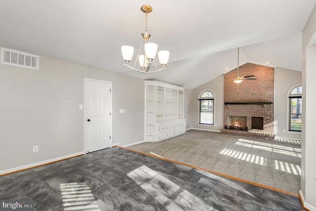 unfurnished living room with baseboards, visible vents, vaulted ceiling, a fireplace, and dark carpet