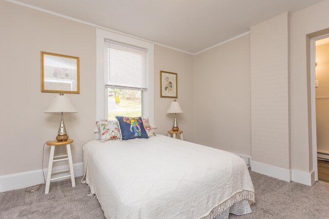 bedroom with crown molding, light carpet, and baseboard heating