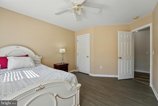 bedroom with baseboards, dark wood-style floors, and ceiling fan