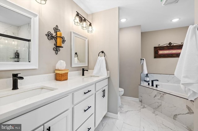 full bathroom with vanity, toilet, and separate shower and tub