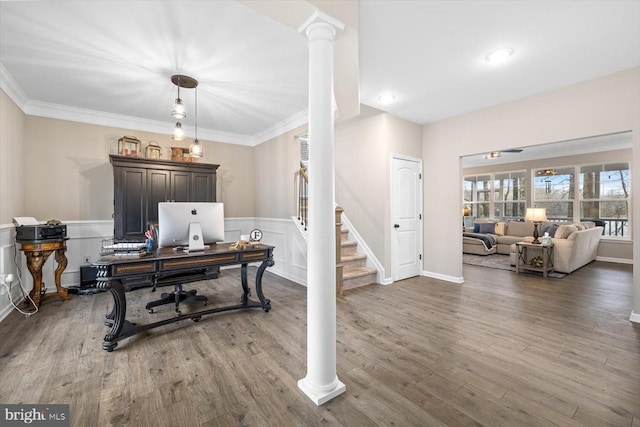 office featuring ornamental molding, wood-type flooring, and decorative columns