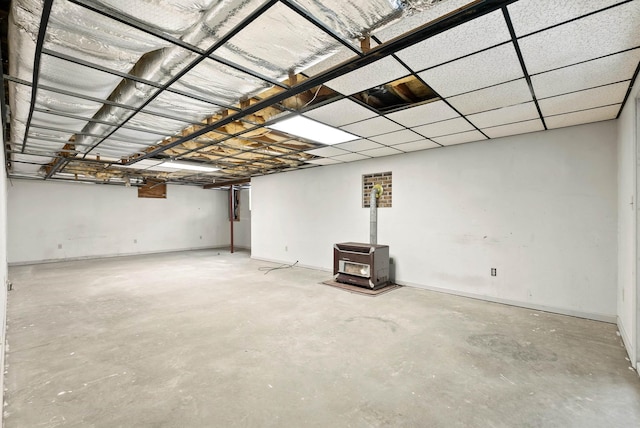 basement featuring a wood stove