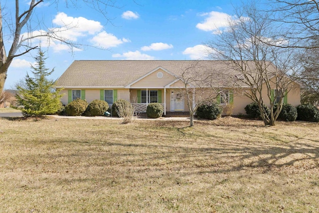 ranch-style house with a front yard