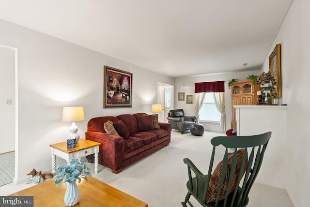 living area with light colored carpet