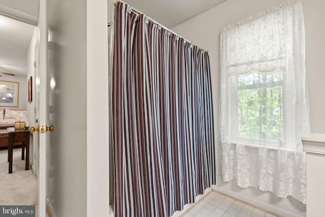 bathroom featuring a shower with curtain