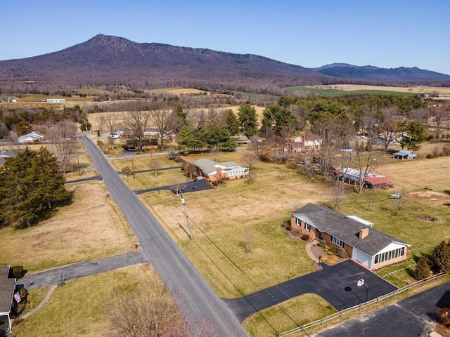 bird's eye view with a rural view and a mountain view