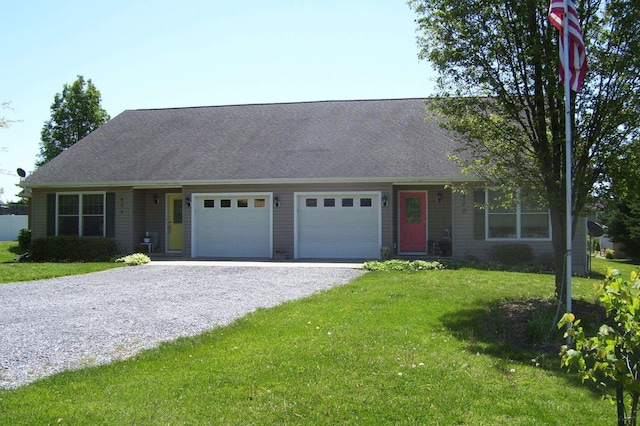 ranch-style house with a front yard, driveway, a shingled roof, and an attached garage