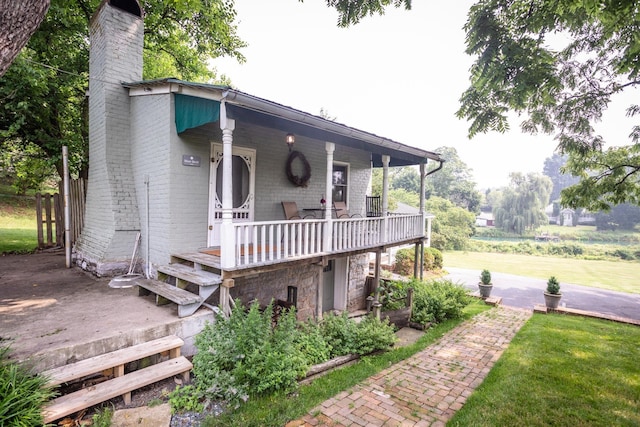 view of front of house with a chimney