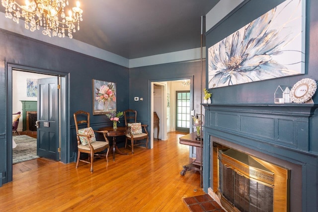 interior space with a fireplace and light wood-style floors