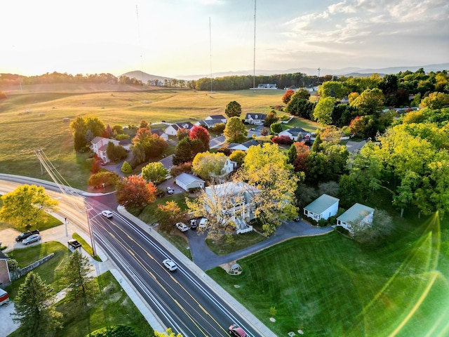 birds eye view of property with a mountain view