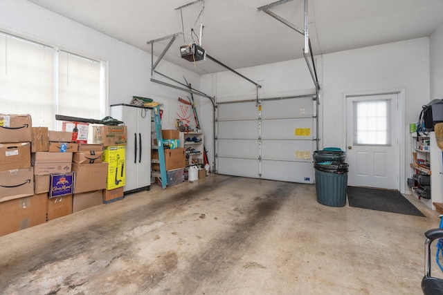 garage featuring a garage door opener